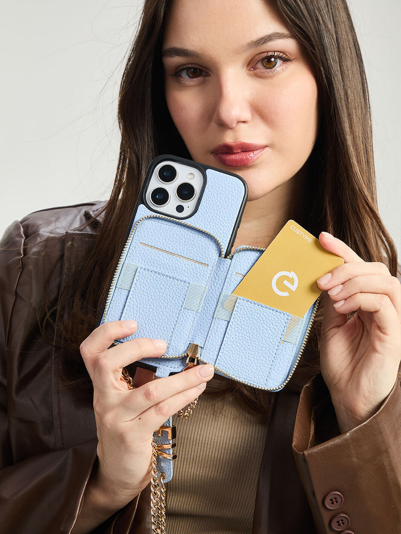 Blue phone case with wristlet
