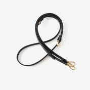 Black leather phone case with strap
