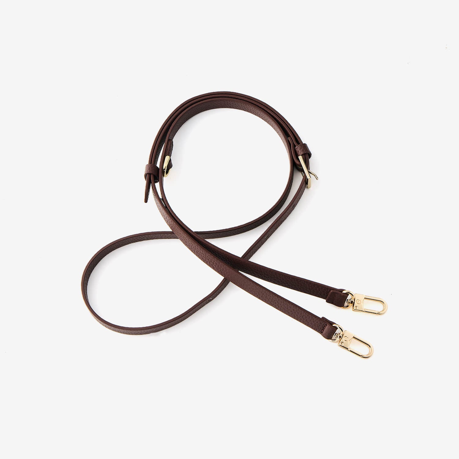 Brown leather crossbody strap with gold hardware 
