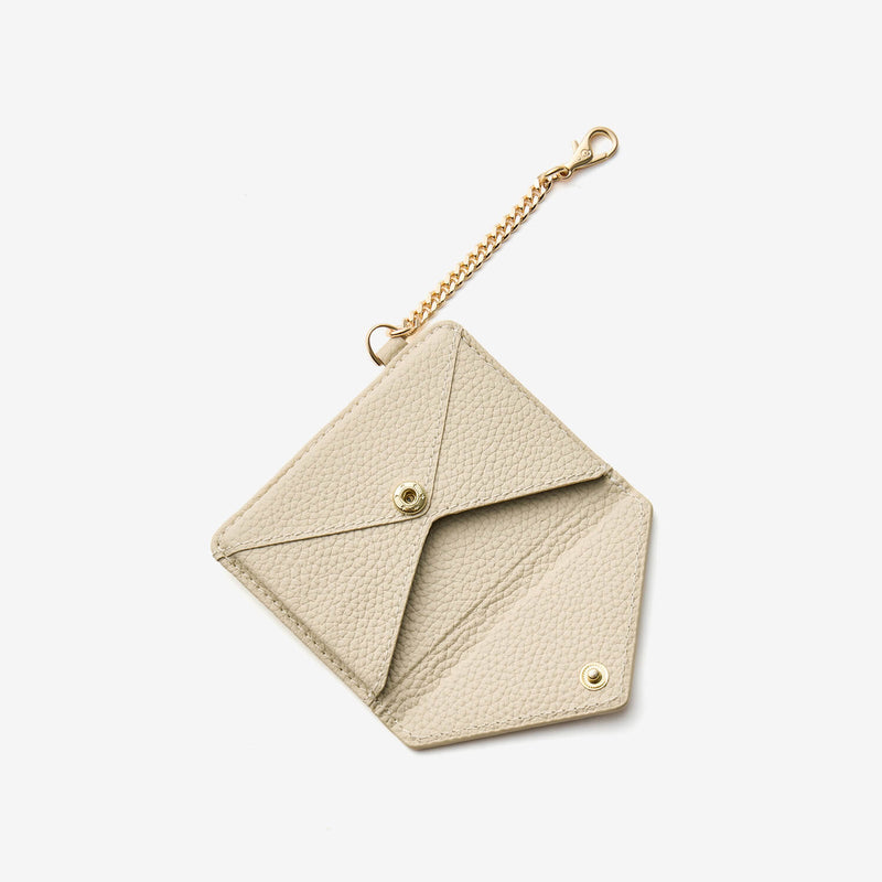 Beige envelope-style wallet with detachable chain for stylish everyday carrying