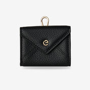 Small leather storage pouch featuring an envelope design for earbuds, keys and personal items