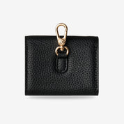 Black envelope-style AirPods pouch designed for wireless earbuds and everyday essentials