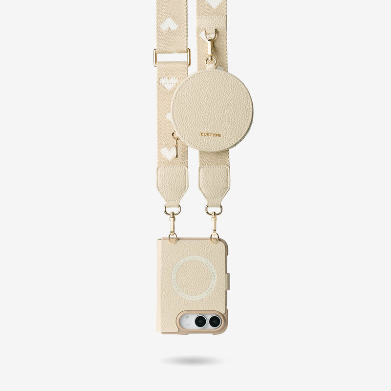 iPhone DUO case with matching beige strap, leather texture and convenient round pouch accessory