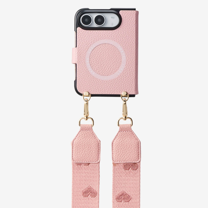 Leather iPhone DUO crossbody case designed with a pink finish and removable carrying strap