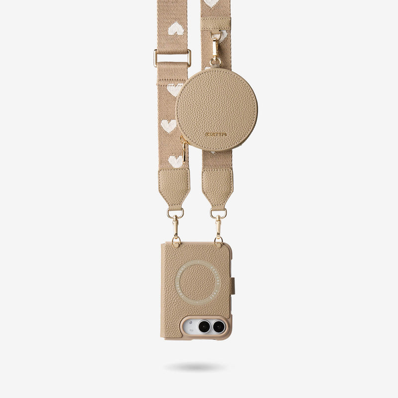 Elevated taupe iPhone DUO MagSafe case with matching strap and zipper pouch for daily carry