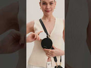 Black iPhone 17 Pro Max crossbody phone case with Round pouch for dog walking