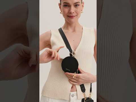 Black iPhone 17 Pro Max crossbody phone case with Round pouch for dog walking