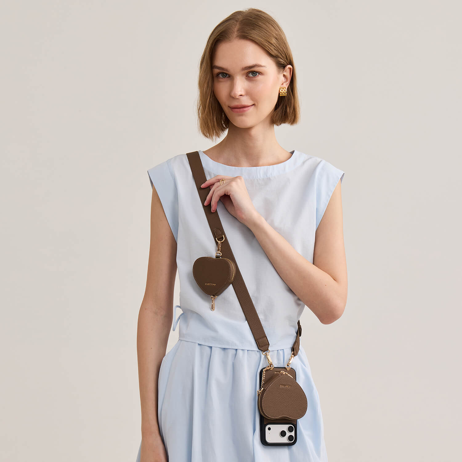 roam_kit_iphone_case_with_magnetic_heart_pouch_and_wide_strap_mocha_1.jpg