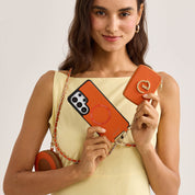 orange phone cases with a chain strap and wallet for samsung s26 ultra