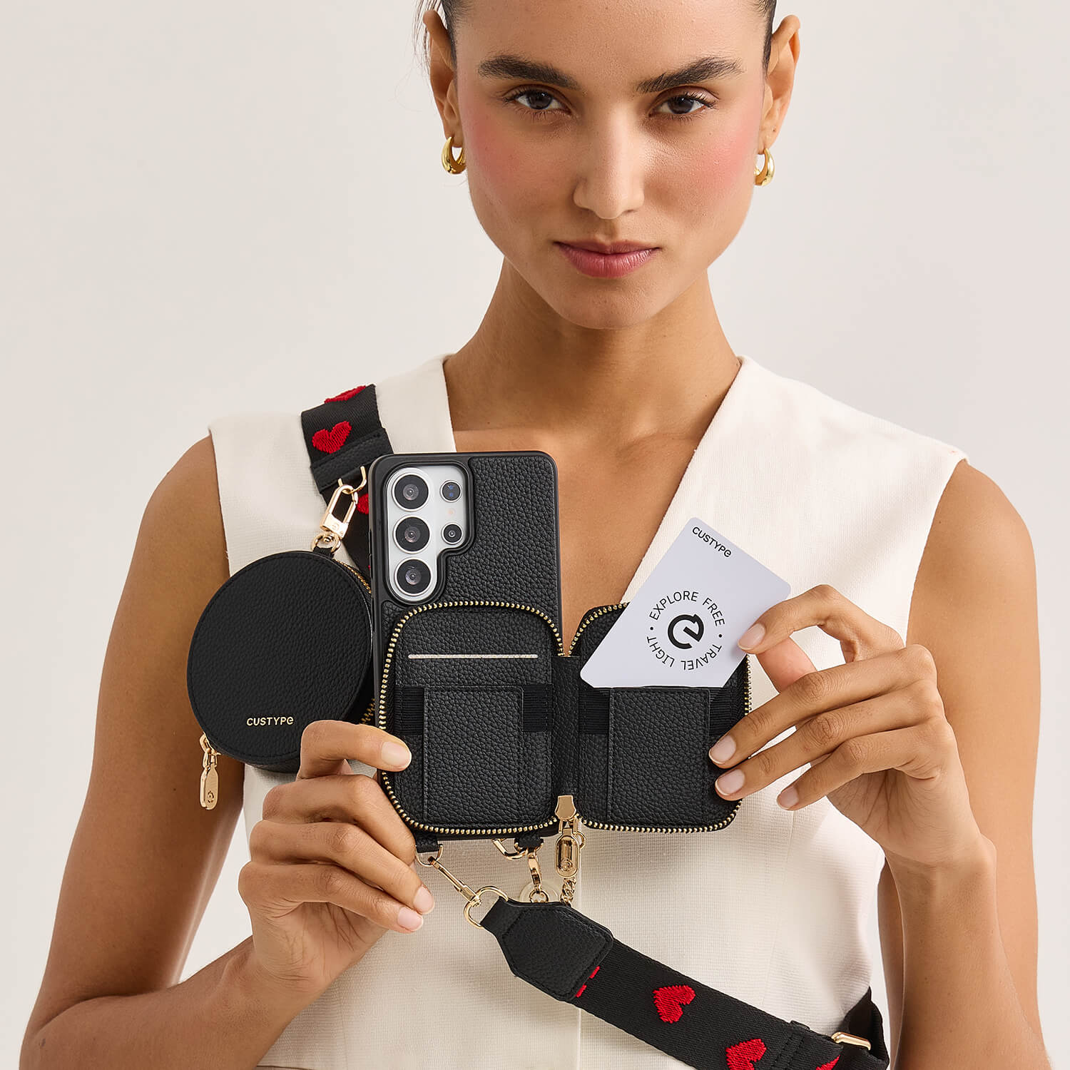 black phone case with multiple compartments wallet and a card
