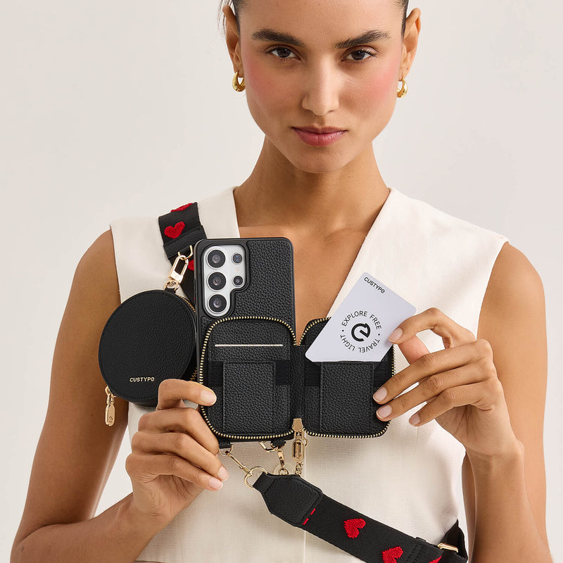 black phone case with multiple compartments wallet and a card