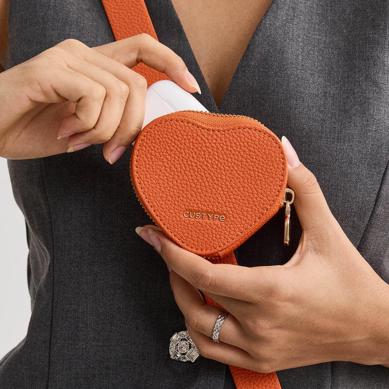 Orange Heart pouch with AirPods storage for everyday use



