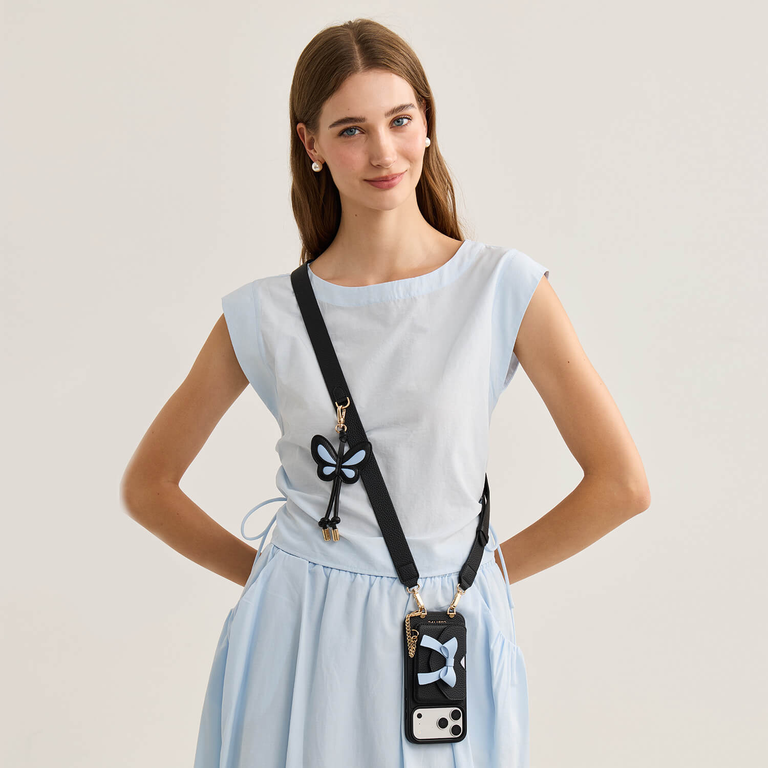 wallet_phone_case_with_wide_strap_and_butterfly_charm_black_1_826f3758-6355-4c63-acb3-b8f20244d6f8.jpg